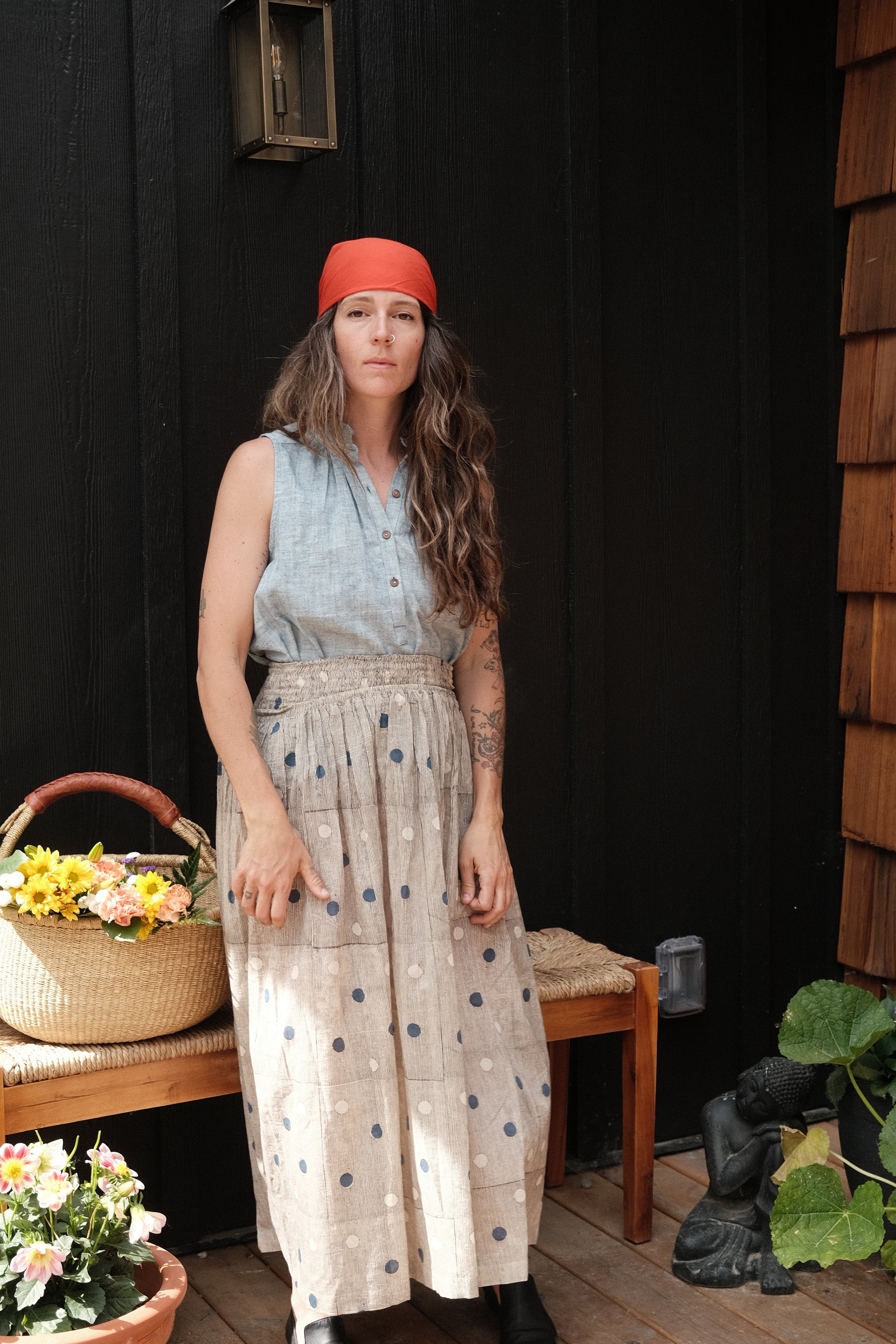 This a gathered skirt with a vintage look. The polka dots add the charm to the skirt, the colors are subtle and soothing to the eyes. The smocked waist gives it an easy closure and comfortable to wear all day.