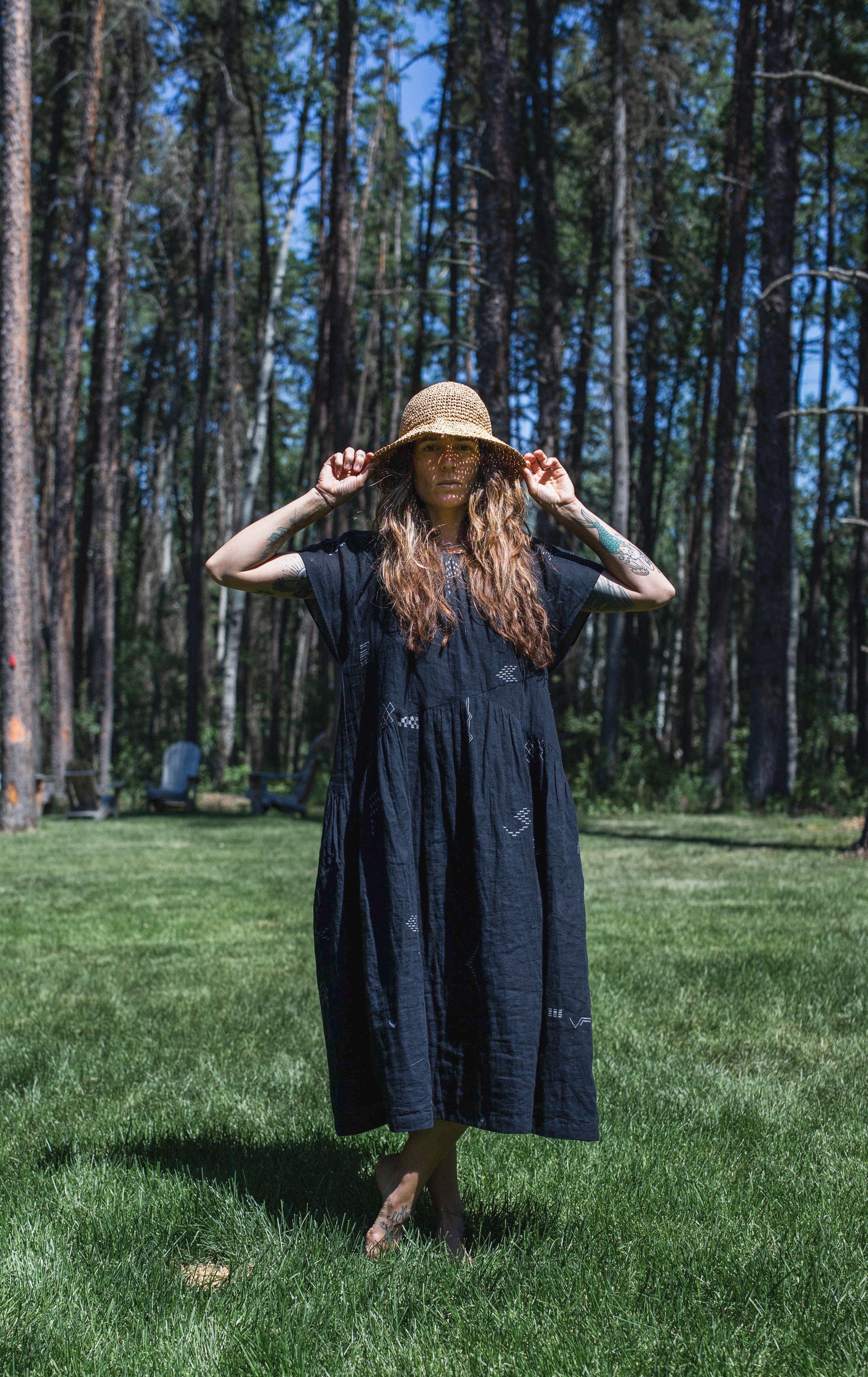 This black dress falls on the body easily. It's made with Jamdani fabric, which is soft and extremely light weight. Perfect for everyday wear.