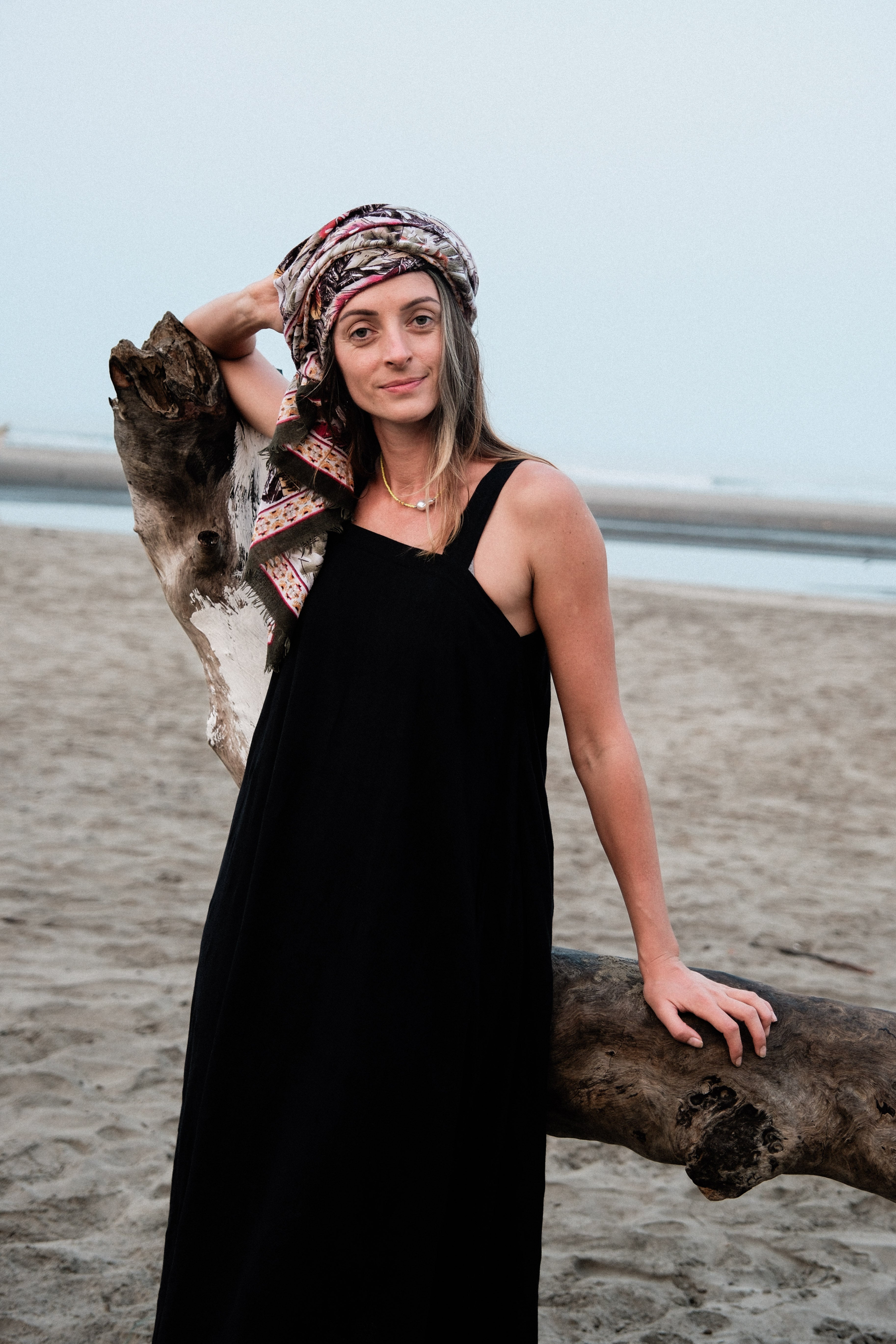 This Everywhere dress is made in collaboration between Erica Kim and World of Crow, it's sleeveless, black in color, Jamdani fabric, Midi length, Sustainably made