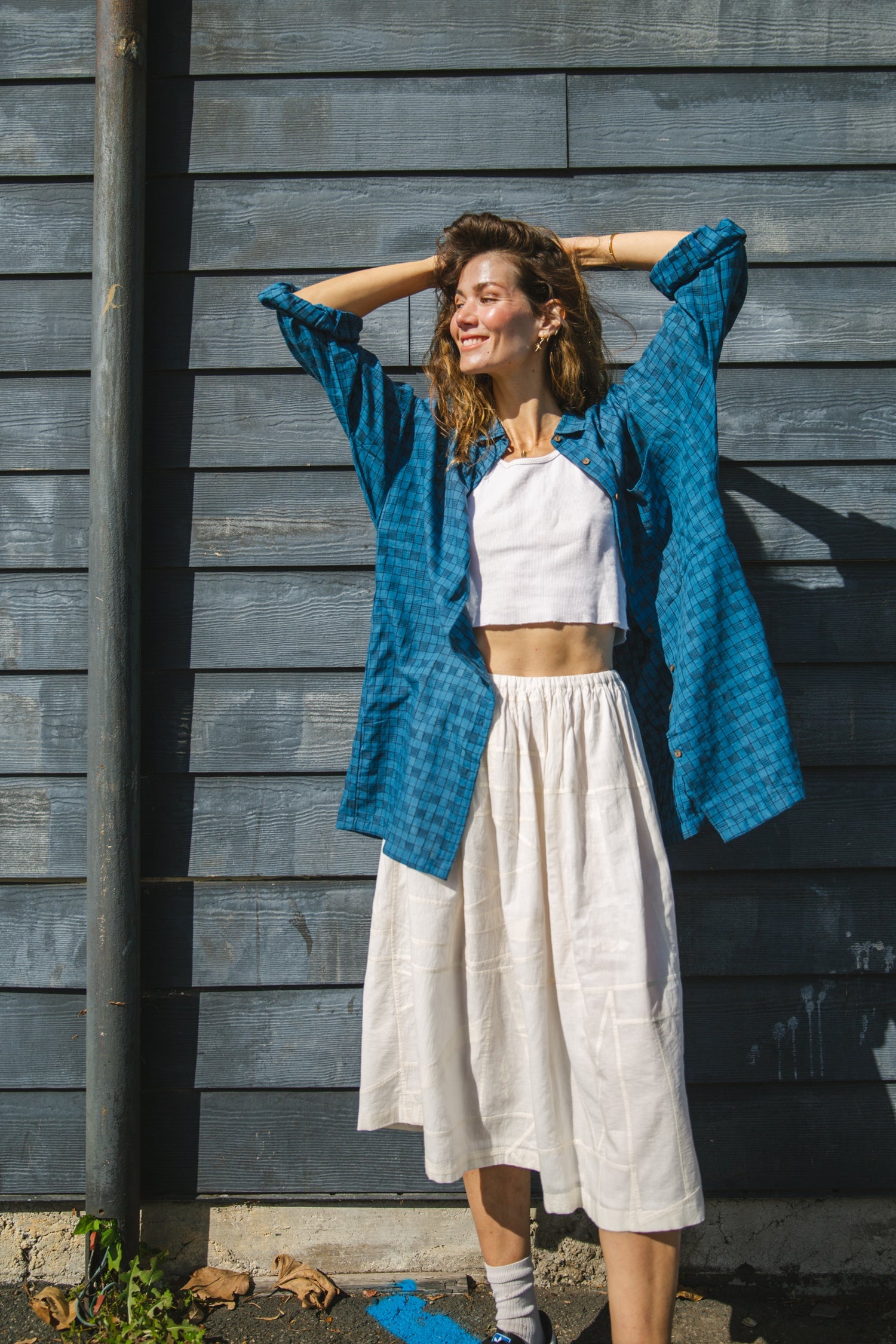 Blue long-sleeve button-down shirt with a subtle textured pattern. Features a classic pointed collar and a relaxed fit, perfect for effortless styling. Made from breathable fabric for all-day comfort. Ideal for casual and semi-formal looks.