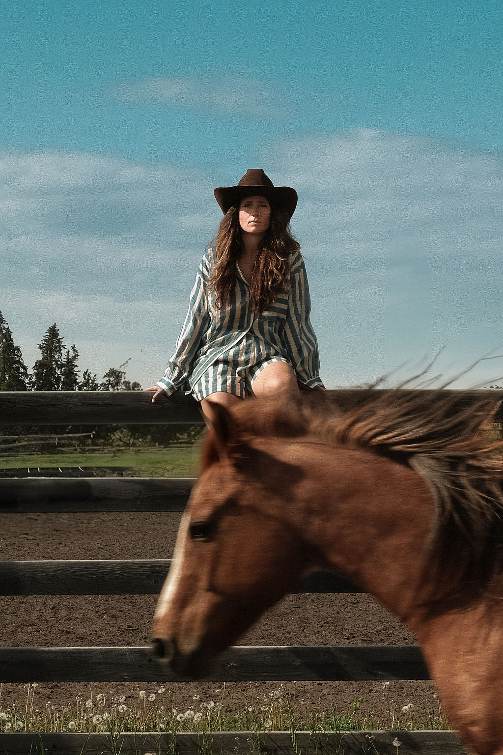 This summer blue artist smock has vertical blue and white stripes, classic collar, and a chest pocket with contrasting horizontal stripes. Made with soft cotton fabric and natural color.  The coconut buttons add the charm to the shirt and ensure an easy enclosure.