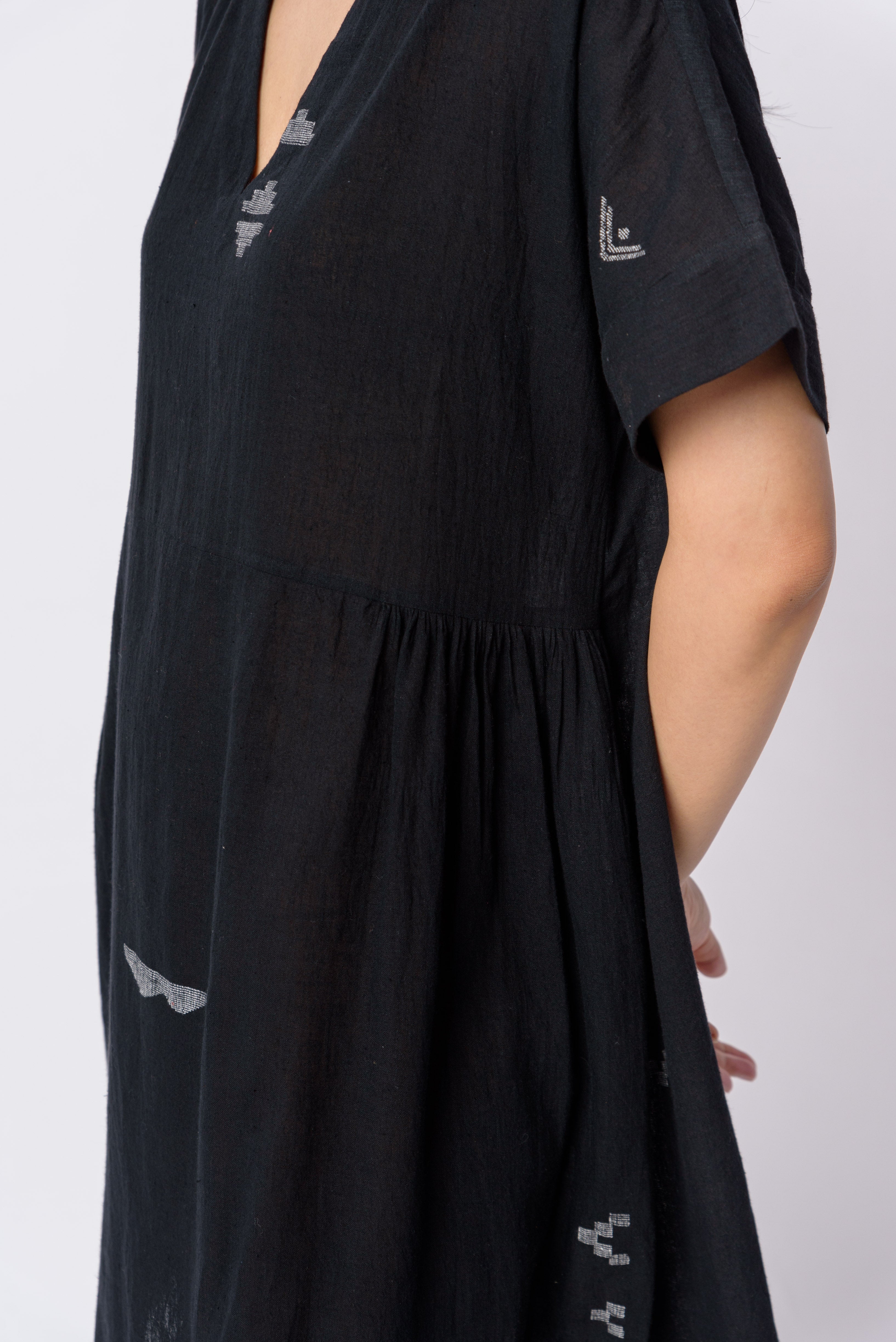 Timeless black short dress, most ethical clothing companies, responsible clothing brands, organic cotton dress, organic cotton online, cotton clothing store near me, lightweight cotton women's clothing, ethical women's clothing brands, ethical women's fashion, minimalist brands men's, minimalist chic style