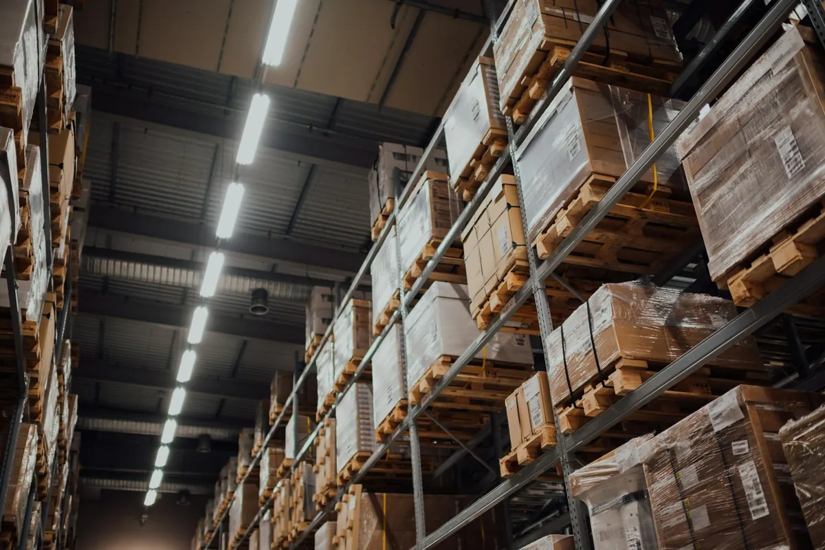 Warehouse shelving stacked with cartons