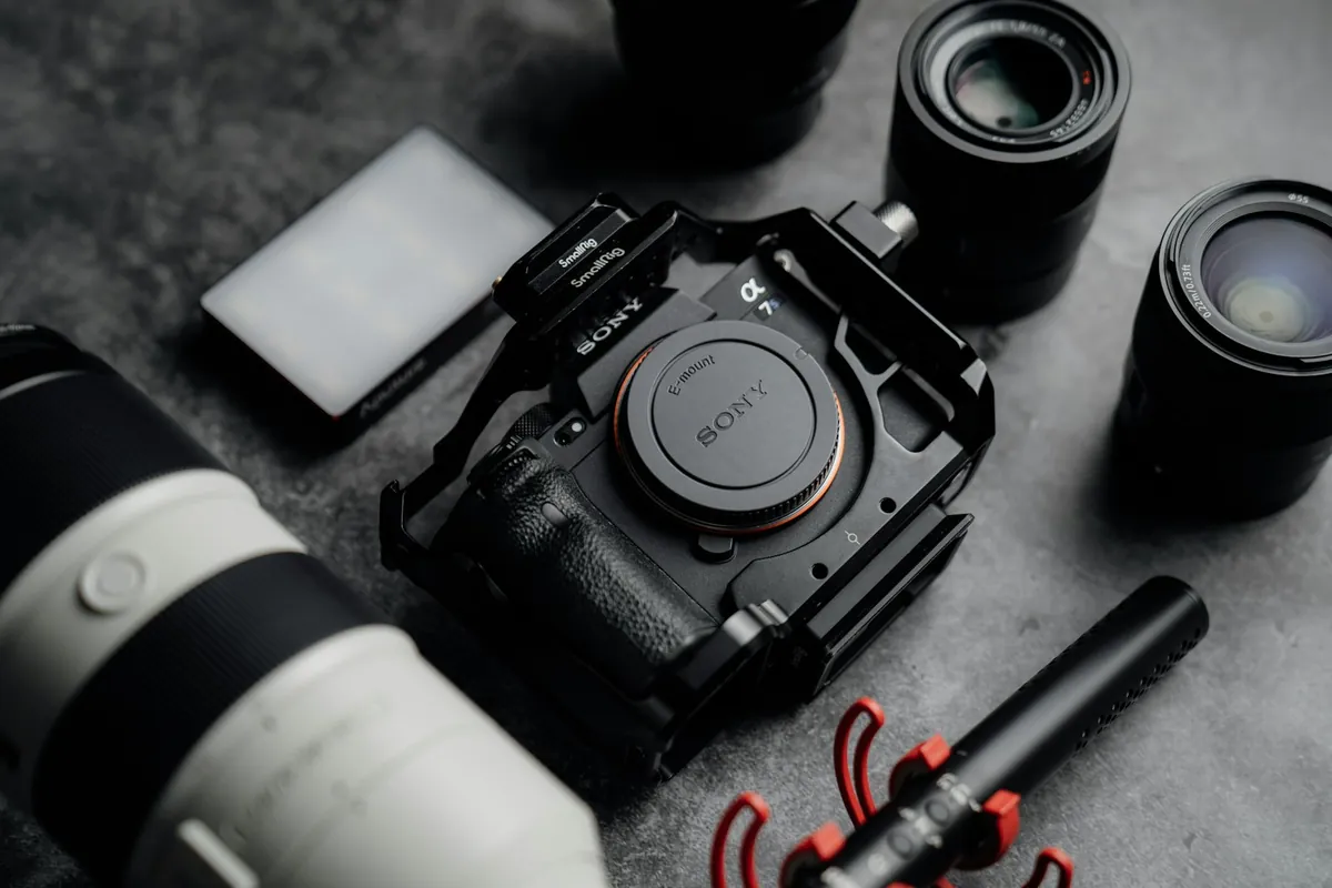 Camera gear laid out on a desk