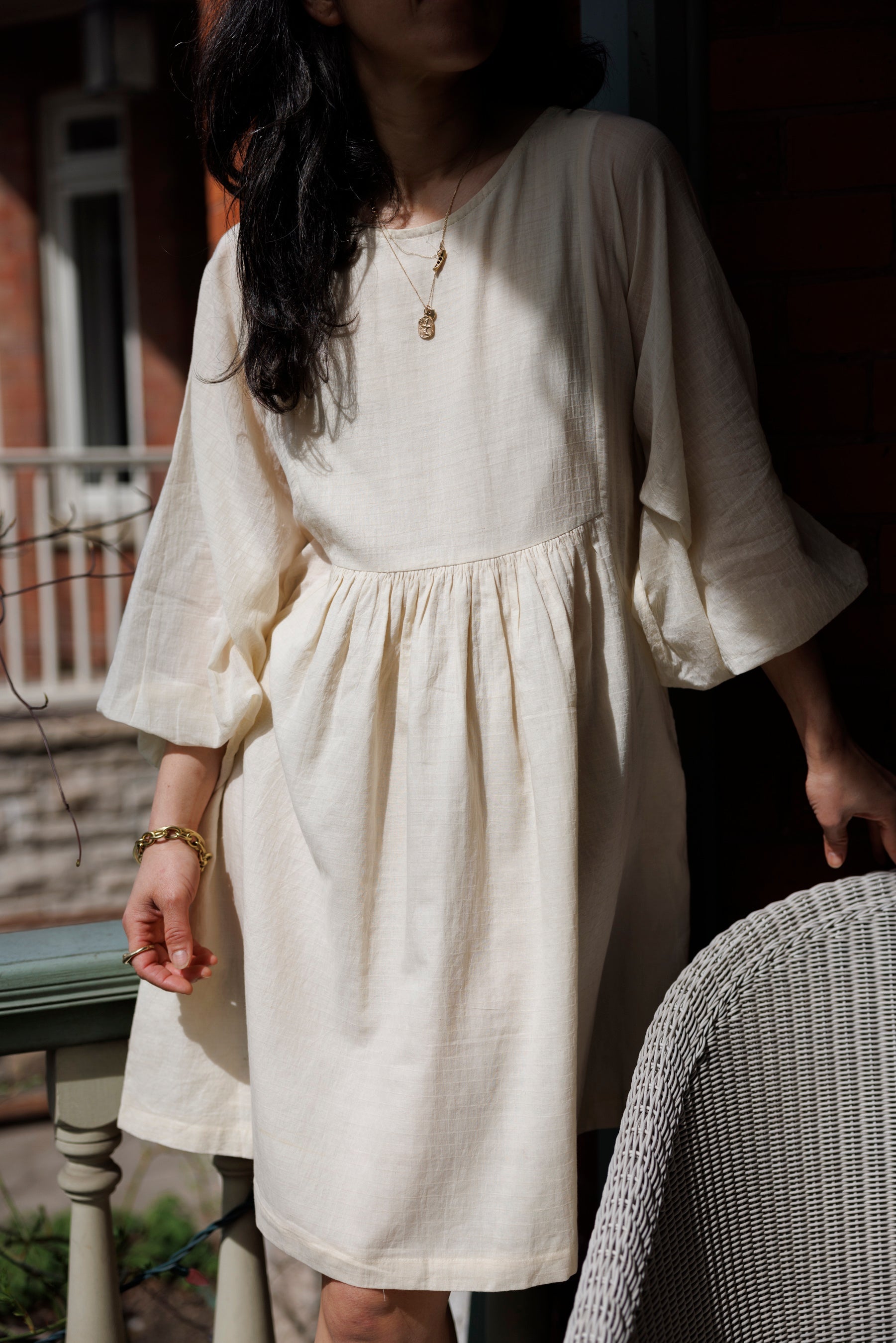 Romantic dress, day at a beach waering world of crow, Erica Kim in collaboration with World of Crow, White color dress, sustainable clothing