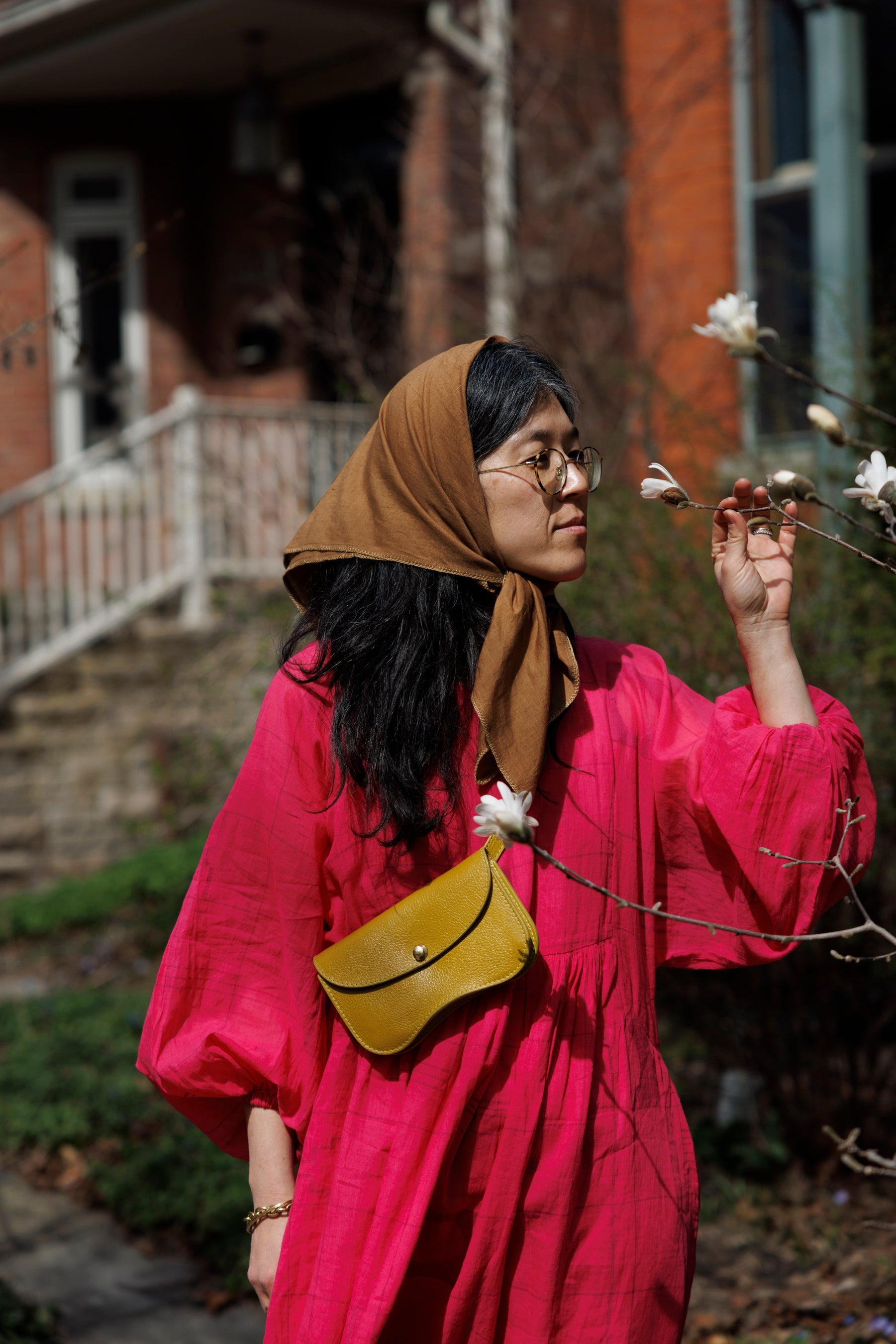 This Get Away Dress is made in a collaboration between Erica Kim @ahistoryofarchitecture and World of Crow, the dress has a scoop neck, barbie pink color, light checks in jamdani fabric