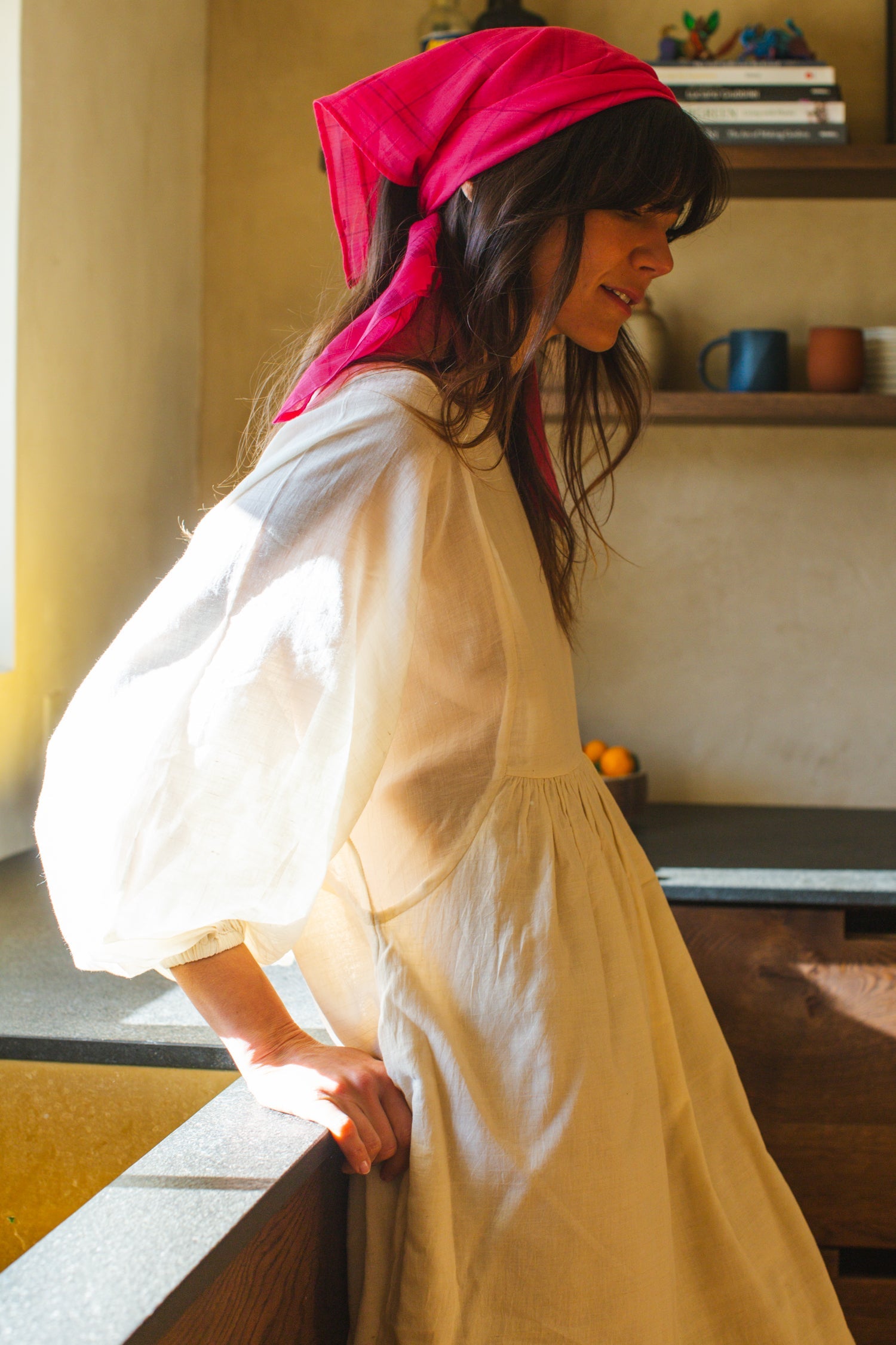 Introducing the Get Away Bandana, a vibrant accessory in a captivating Barbie pink hue. Crafted from exquisite Jamdani fabric, it offers both style and versatility. Wear it as a chic scarf to elevate any outfit, or tie it in your hair for a playful yet sophisticated look. This bandana is the perfect accessory for adding a pop of color and flair to your ensemble.