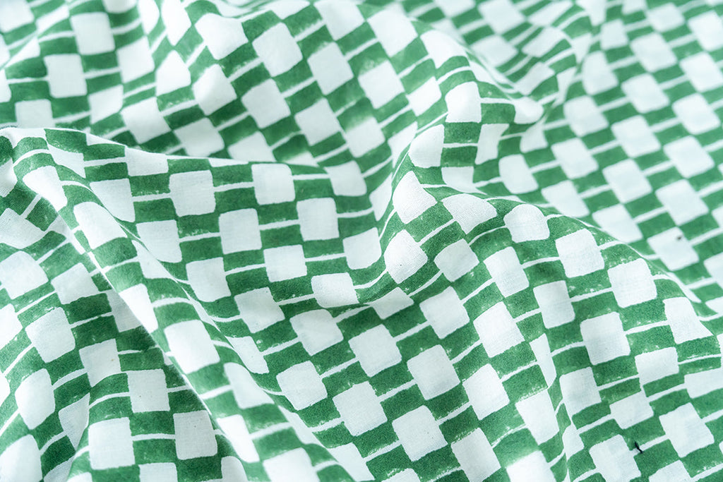 A detailed look at our hand block printed fabric with green colored azo free dye